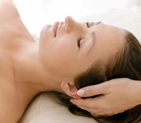 Craniosacral therapy session supporting the central nervous system and chronic pain relief