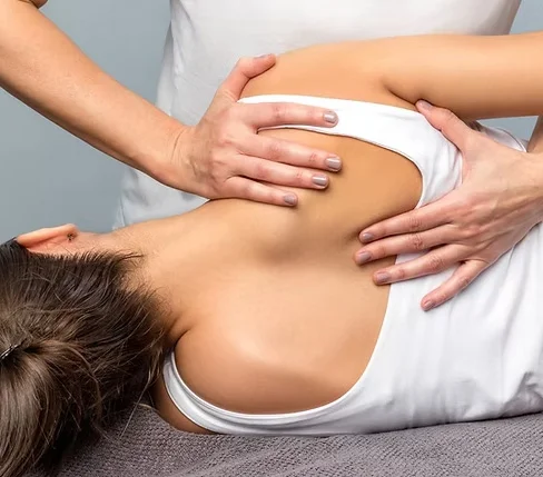 Experienced clinical massage therapist providing chronic pain relief through soft tissue therapy