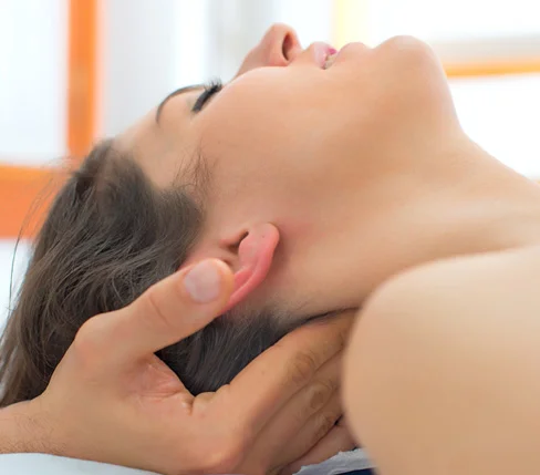 Neuromuscular therapy treatment helping reduce chronic muscle pain and discomfort
