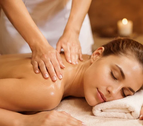 Relaxing Swedish massage therapy session for stress reduction and muscle relaxation